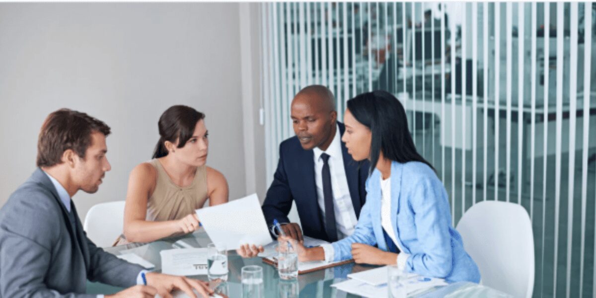 Business meeting discussion around table